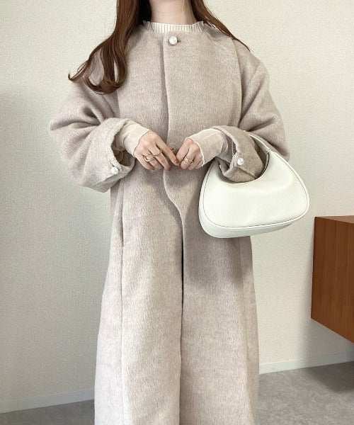 SHAGGY PEARL BUTTON OVER SILHOUETTE COAT