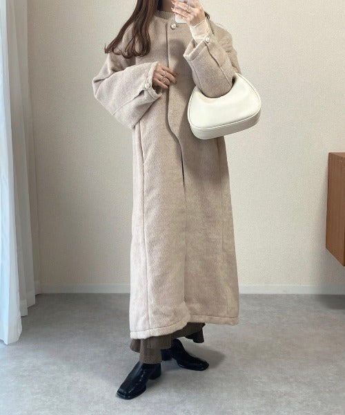 SHAGGY PEARL BUTTON OVER SILHOUETTE COAT